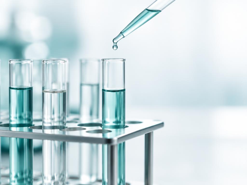 Test tubes and a pipette in a lab rack